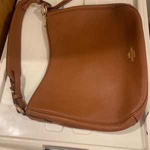 Cognac brown Coach hobo with crossbody strap. Retail value $375